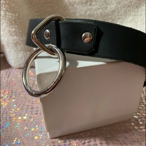 Leather collar with metal ring and clasp